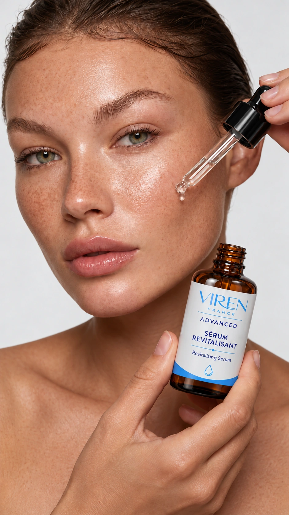 Advanced revitalizing serum applied with a dropper